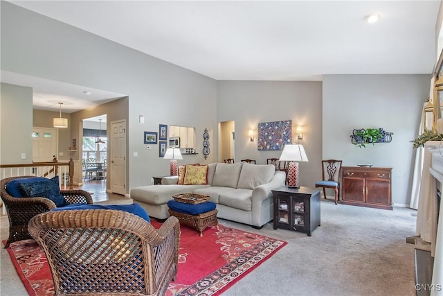 115 Shire Way, Camillus, NY 13031 - living area featuring light colored carpet and lofted ceiling