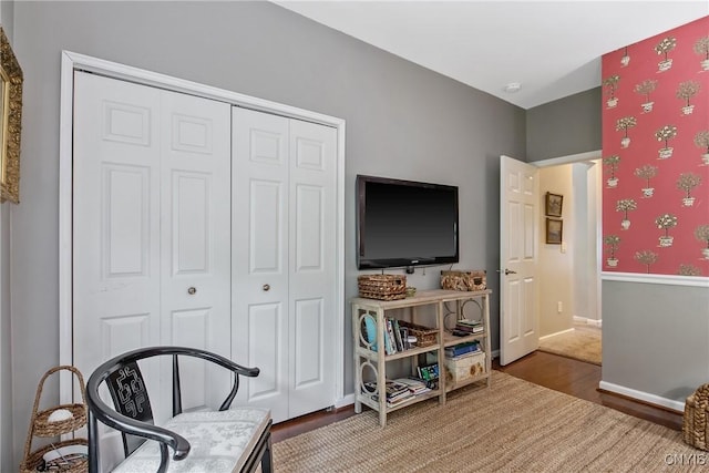 115 Shire Way, Camillus, NY 13031 - sitting room featuring wood finished floors and wallpapered walls