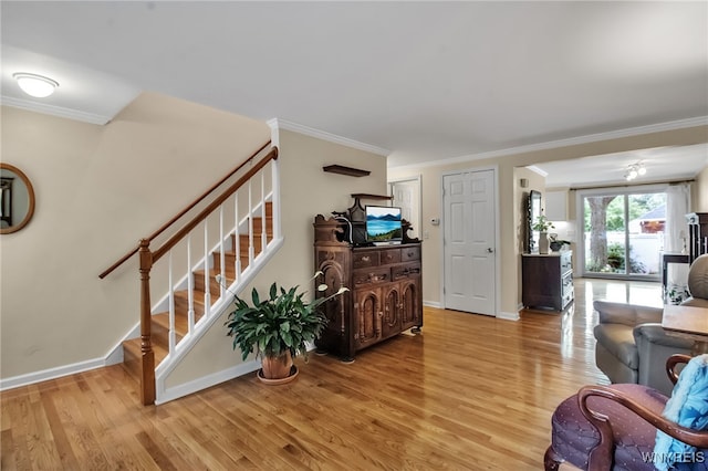 150 S Union Rd Unit 123, Amherst, NY 14221 - living area with stairs, wood finished floors, and ornamental molding