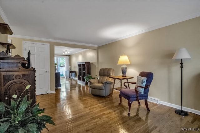 150 S Union Rd Unit 123, Amherst, NY 14221 - living area with wood finished floors and crown molding