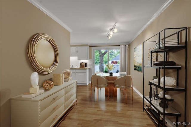 150 S Union Rd Unit 123, Amherst, NY 14221 - dining area with crown molding and light wood finished floors