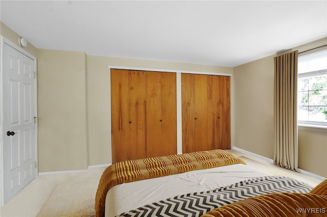 150 S Union Rd Unit 123, Amherst, NY 14221 - bedroom with carpet floors and multiple closets