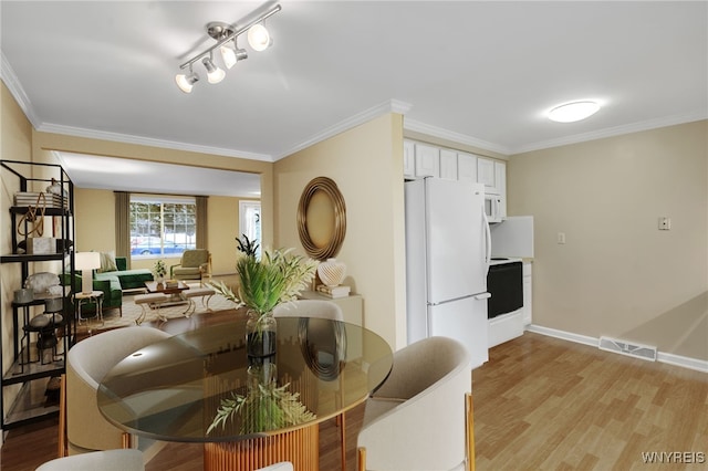150 S Union Rd Unit 123, Amherst, NY 14221 - dining area with light wood-style flooring and crown molding