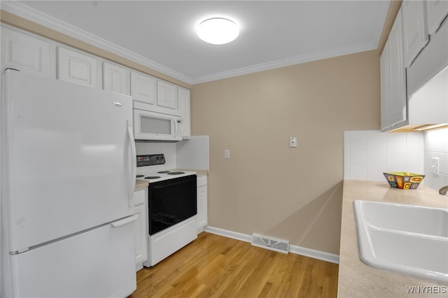 150 S Union Rd Unit 123, Amherst, NY 14221 - kitchen with white appliances, crown molding, light countertops, white cabinetry, and backsplash