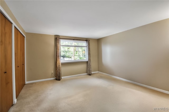 150 S Union Rd Unit 123, Amherst, NY 14221 - unfurnished bedroom featuring light carpet and a closet