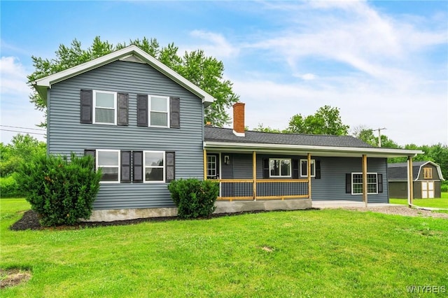 10655 Millers Rd, Yates, NY 14098 - view of front facade featuring a porch, a front lawn, and a chimney