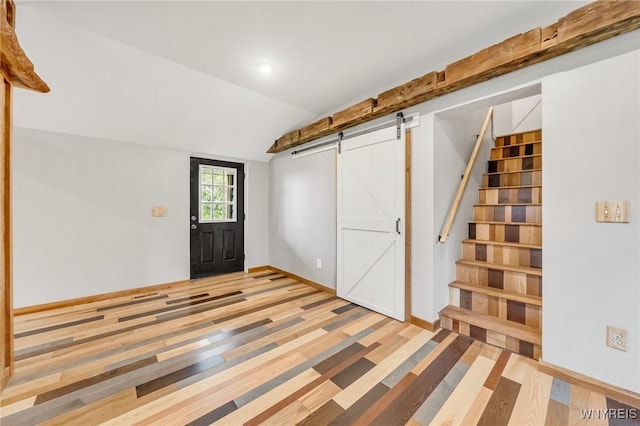 10655 Millers Rd, Yates, NY 14098 - basement with a barn door, stairs, wood finished floors, and recessed lighting