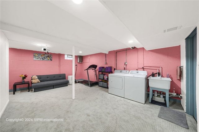 35 Stoneledge, Amherst, NY 14221 - laundry room with washer and clothes dryer, carpet, and concrete block wall