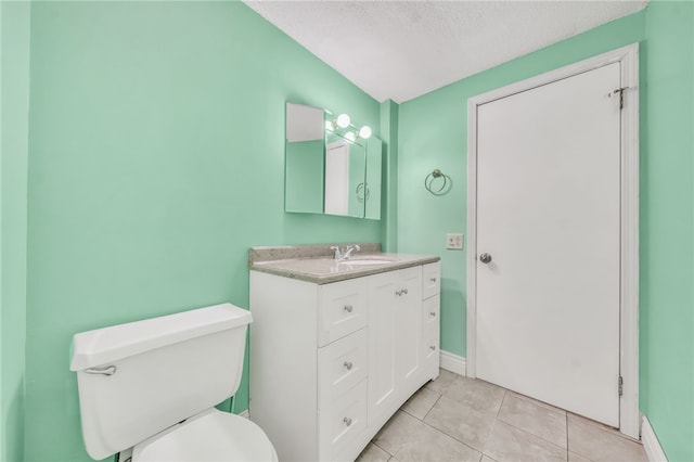 35 Stoneledge, Amherst, NY 14221 - bathroom featuring vanity, tile patterned floors, and a textured ceiling