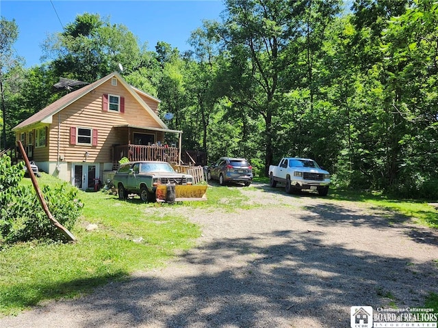 960 Peterson Rd, Carroll, NY 14738 - view of side of home with driveway and a wooded view