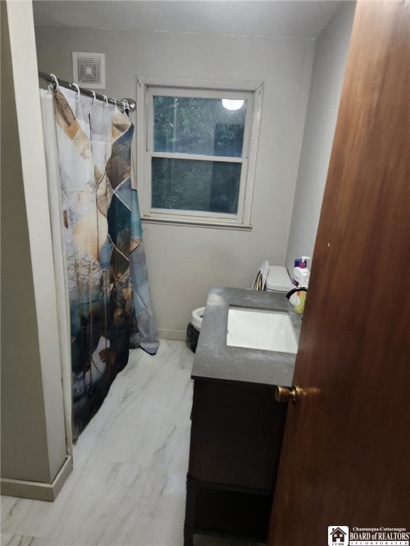 960 Peterson Rd, Carroll, NY 14738 - bathroom featuring a shower with shower curtain, vanity, and marble look tile flooring