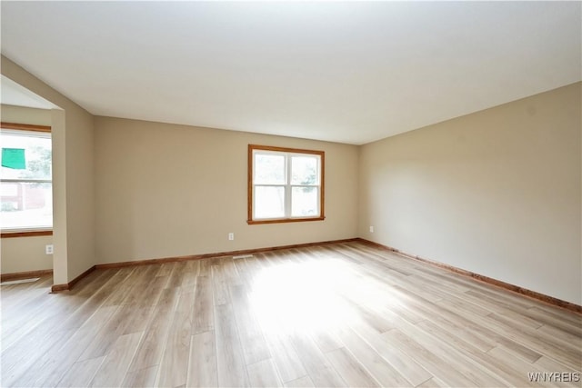 22 Vanderbilt Ave, Cheektowaga, NY 14043 - empty room with light wood finished floors