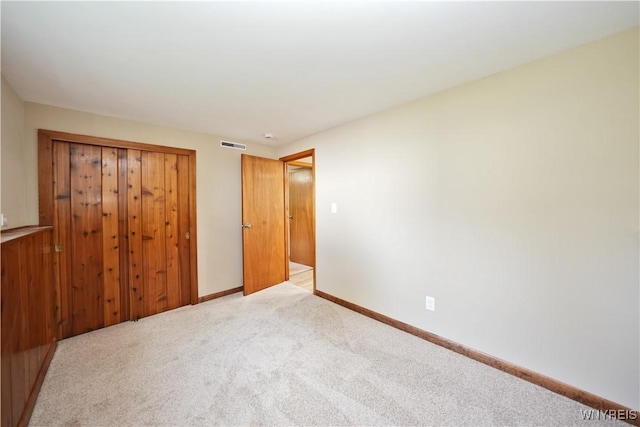 22 Vanderbilt Ave, Cheektowaga, NY 14043 - unfurnished bedroom featuring light carpet and a closet