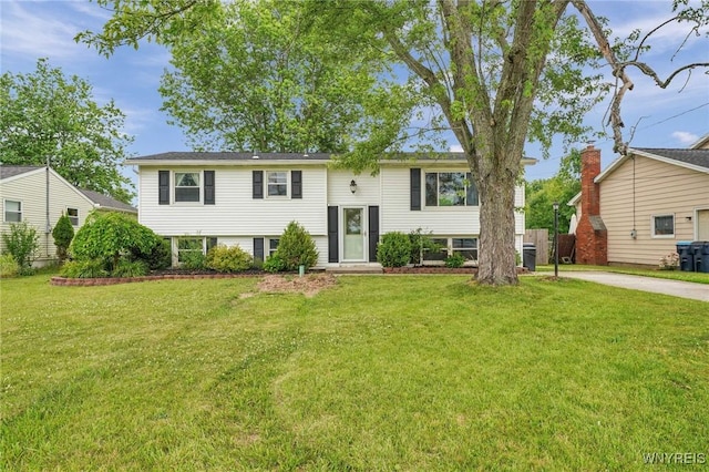 1218 Baseline Rd, Grand Island, NY 14072 - split foyer home featuring a front lawn and concrete driveway