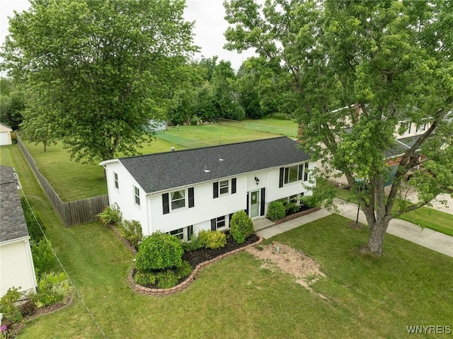 1218 Baseline Rd, Grand Island, NY 14072 - raised ranch with a shingled roof and view of wooded area