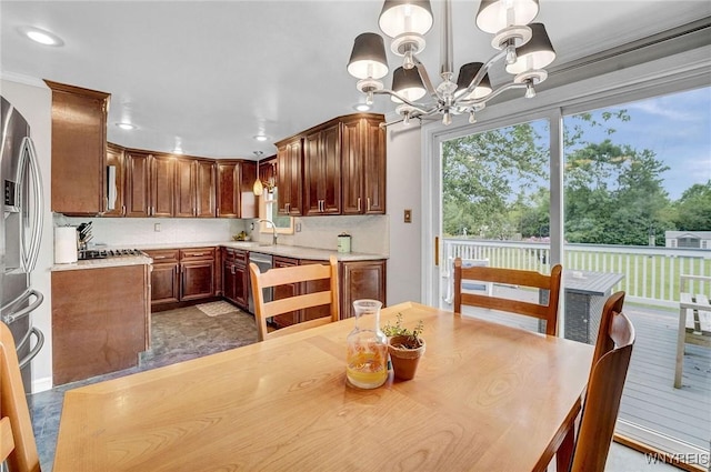 1218 Baseline Rd, Grand Island, NY 14072 - dining room with a chandelier and recessed lighting