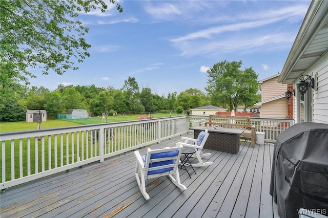 1218 Baseline Rd, Grand Island, NY 14072 - deck featuring grilling area, a shed, a yard, outdoor dining space, and view of wooded area
