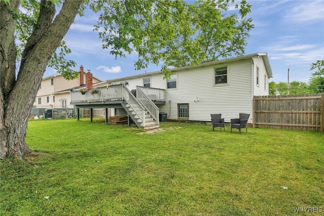 1218 Baseline Rd, Grand Island, NY 14072 - rear view of house with a deck and stairway