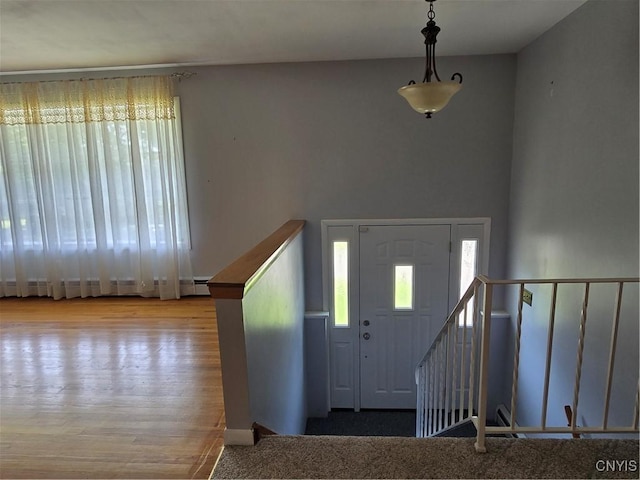 4777 Glencrest Ave, Clay, NY 13088 - entryway featuring a baseboard radiator and wood finished floors