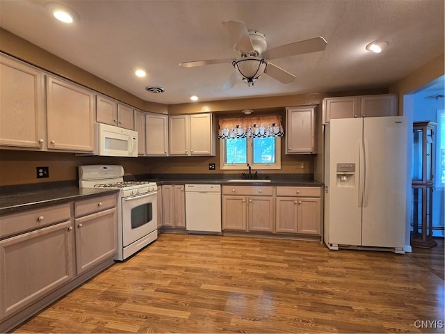 4777 Glencrest Ave, Clay, NY 13088 - kitchen with white appliances, dark countertops, a ceiling fan, light wood finished floors, and recessed lighting