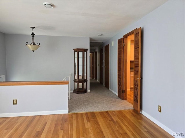 4777 Glencrest Ave, Clay, NY 13088 - spare room featuring wood finished floors and a smoke detector