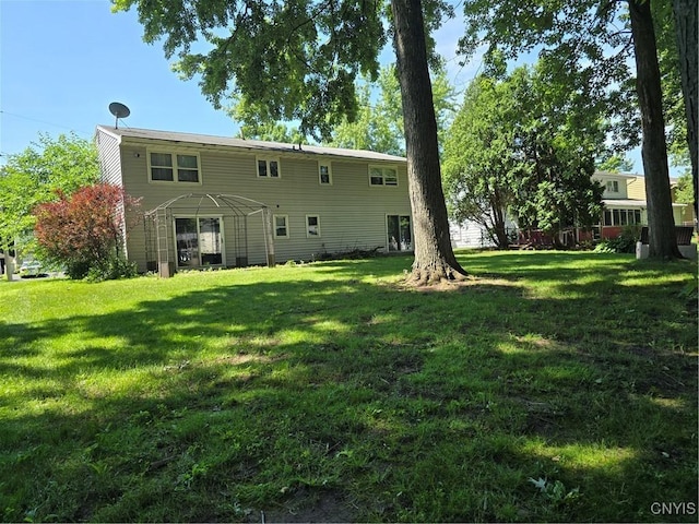 4777 Glencrest Ave, Clay, NY 13088 - back of property with a yard
