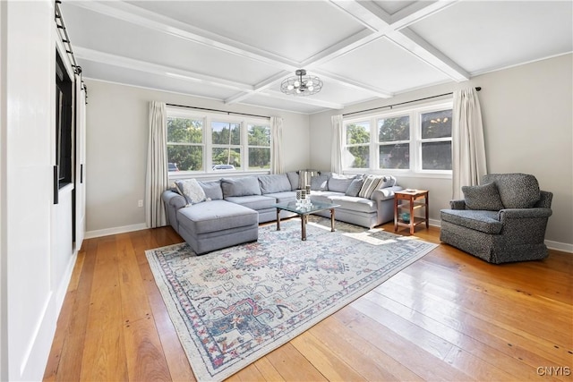 200 Audubon Rd, Manlius, NY 13066 - living room featuring light wood-type flooring, plenty of natural light, coffered ceiling, a chandelier, and beam ceiling