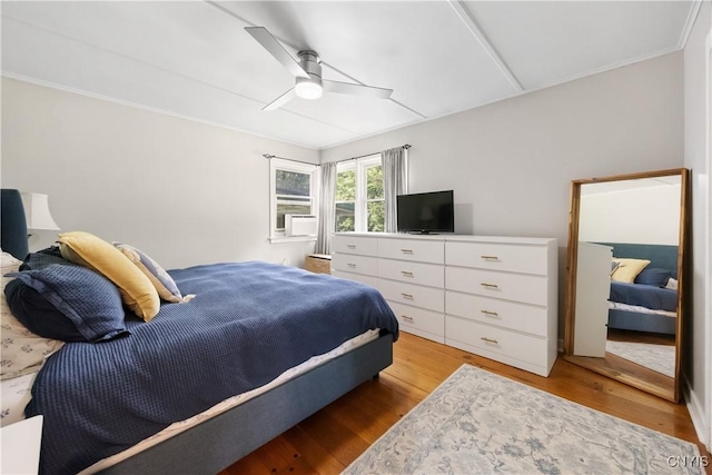 200 Audubon Rd, Manlius, NY 13066 - bedroom with light wood-type flooring, ceiling fan, cooling unit, and ornamental molding