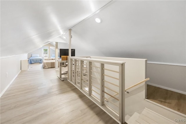 200 Audubon Rd, Manlius, NY 13066 - hall featuring an upstairs landing, wood finished floors, and lofted ceiling