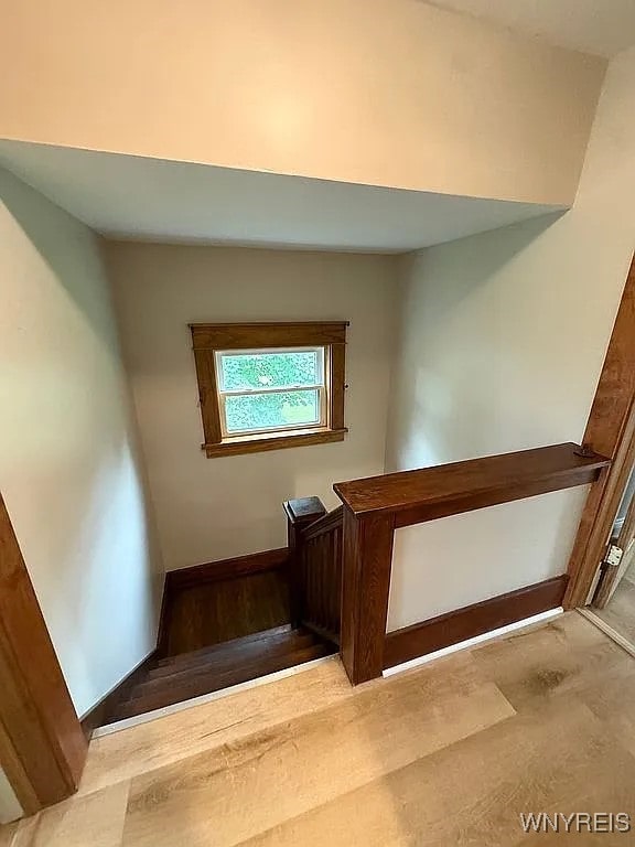 10448 Clarence Center Rd, Clarence, NY 14031 - stairs featuring baseboards