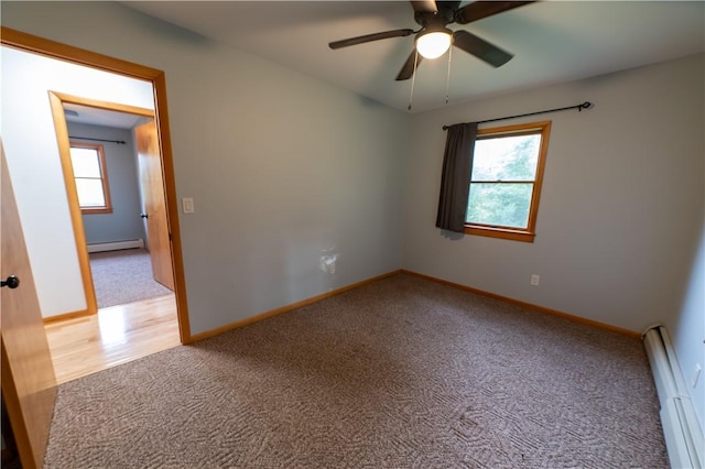 817 Flax Island Rd, Otego, NY 13825 - carpeted empty room featuring a baseboard radiator and a ceiling fan