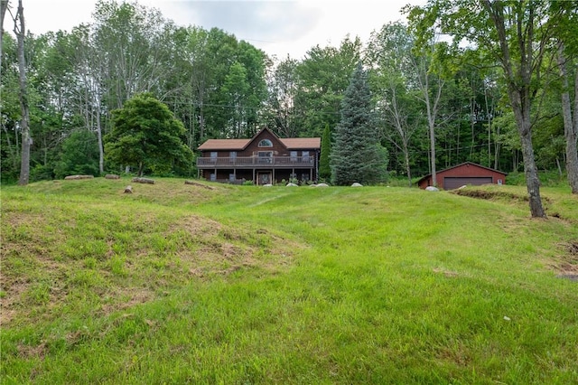 817 Flax Island Rd, Otego, NY 13825 - view of grassy yard with a detached garage, an outbuilding, and a deck
