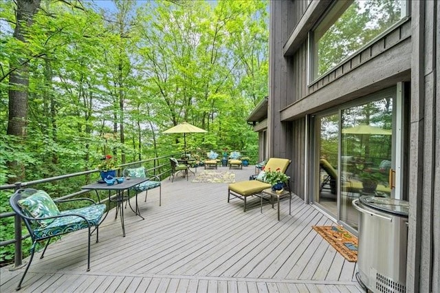 823 Skylane, Union, NY 13760 - deck featuring outdoor dining space and view of wooded area