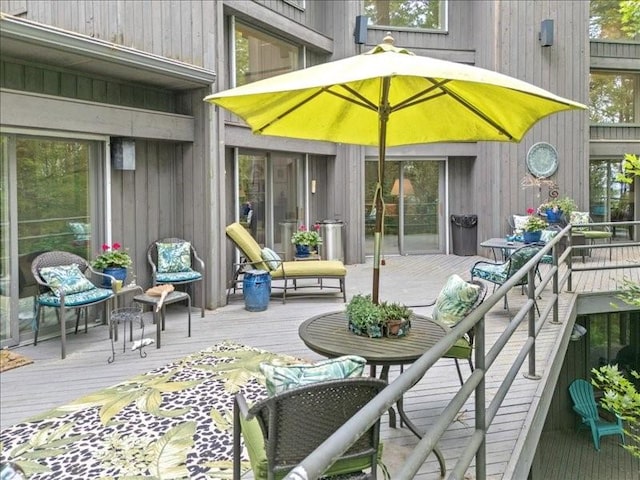 823 Skylane, Union, NY 13760 - rear view of property with a wooden deck and outdoor dining area