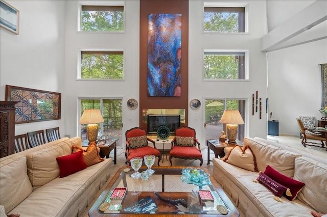823 Skylane, Union, NY 13760 - living area with a high ceiling and a glass covered fireplace