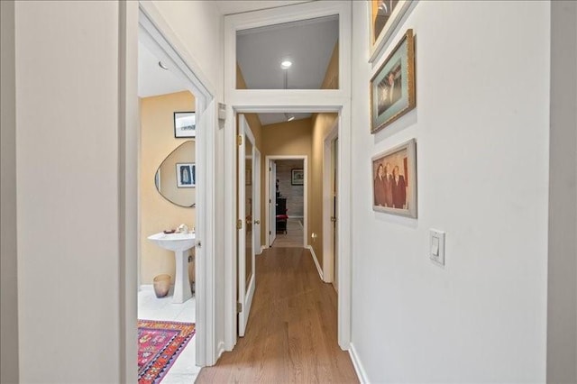 823 Skylane, Union, NY 13760 - hallway featuring light wood-type flooring and baseboards