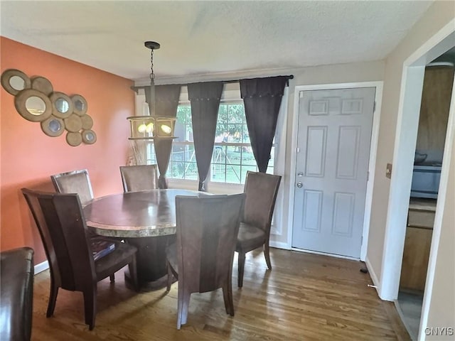 210 Wynnfield Dr, Camillus, NY 13219 - dining area with wood finished floors and baseboards