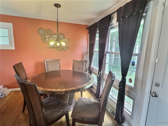 210 Wynnfield Dr, Camillus, NY 13219 - dining area with healthy amount of natural light and wood finished floors