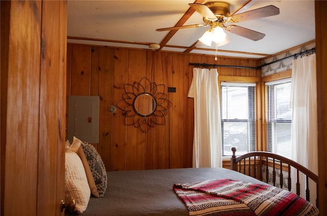 5681 Leidenfrost Adams Rd, Hector, NY 14841 - bedroom with electric panel, wood walls, and ceiling fan