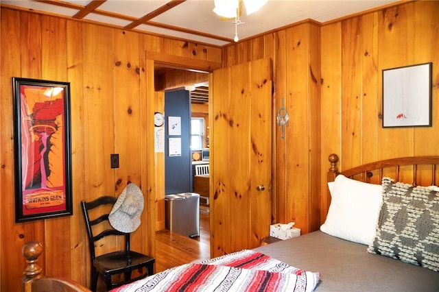 5681 Leidenfrost Adams Rd, Hector, NY 14841 - bedroom featuring wooden walls and wood finished floors
