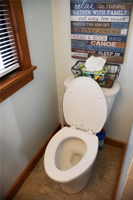 5681 Leidenfrost Adams Rd, Hector, NY 14841 - bathroom with toilet and baseboards