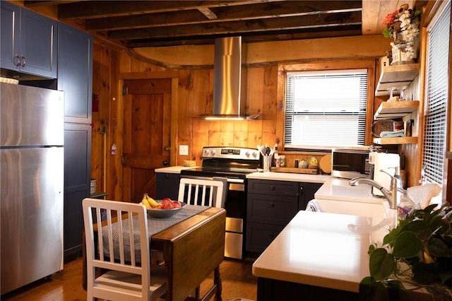 5681 Leidenfrost Adams Rd, Hector, NY 14841 - kitchen with appliances with stainless steel finishes, wall chimney range hood, dark wood finished floors, light countertops, and beam ceiling