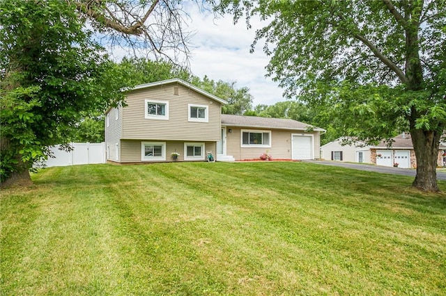 209 Thompson Rd, Henrietta, NY 14623 - view of front of property with an attached garage and driveway
