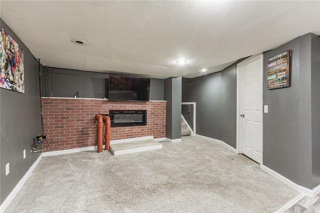 209 Thompson Rd, Henrietta, NY 14623 - unfurnished living room with a brick fireplace, carpet flooring, stairway, and recessed lighting