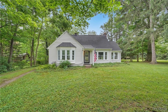 7709 Olean Rd, Holland, NY 14080 - view of front of property with a chimney, a front lawn, and a shingled roof