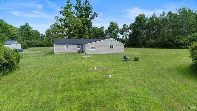 9184 Newcomb Rd, Evans, NY 14006 - rear view of house with a yard