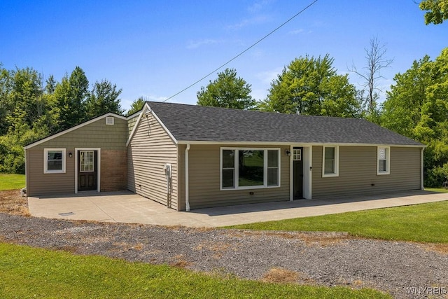9184 Newcomb Rd, Evans, NY 14006 - ranch-style house featuring a patio and a shingled roof