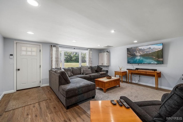 9184 Newcomb Rd, Evans, NY 14006 - living room with wood finished floors and recessed lighting