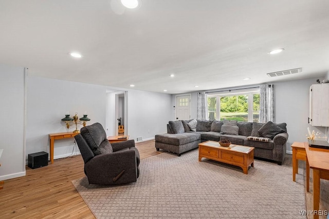 9184 Newcomb Rd, Evans, NY 14006 - living area with light wood-style floors and recessed lighting