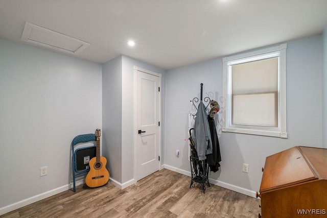 9184 Newcomb Rd, Evans, NY 14006 - below grade area featuring wood finished floors and recessed lighting